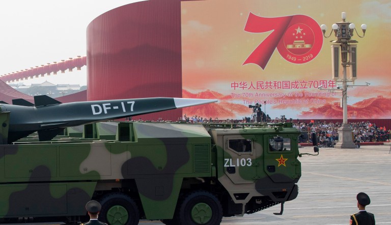 Chinese military vehicles carrying DF-17 roll during a parade to commemorate the 70th anniversary of the founding of Communist China in Beijing, Tuesday, Oct. 1, 2019.