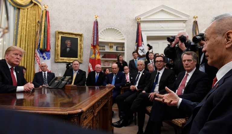 President Donald Trump, left, holds a meeting with Chinese Vice Premier Liu He, right, in the Oval Office of the White House in Washington, Thursday, Jan. 31, 2019. 