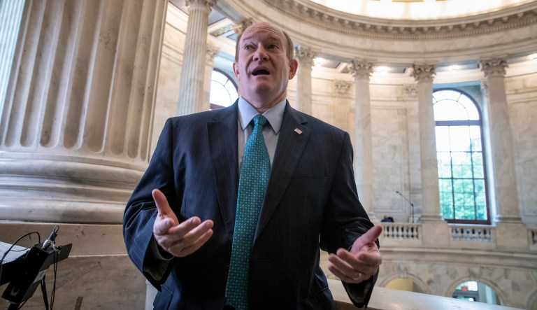 Sen. Chris Coons, D-Del., a member of the Senate Judiciary Committee, comments on Supreme Court nominee Brett Kavanaugh amid scrutiny of a woman's claim he sexually assaulted her at a party when they were in high school, on Capitol Hill in Washington, Tuesday, Sept. 18, 2018.