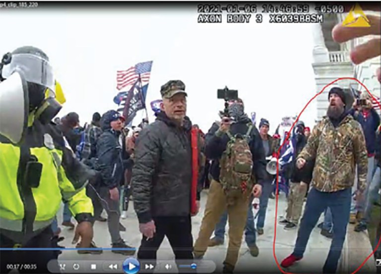 FILE - In this Dec. 14, 2019 file photo, Navy midshipmen march onto field ahead of an NCAA college football game between the Army and the Navy in Philadelphia. Video of midshipmen and cadets making hand gestures in the stands at the Army-Navy football game outraged some commentators who claimed they were "white power" signals, and exasperated others who say the students were merely playing a popular children's game. The U.S. military and naval academies are investigating. 