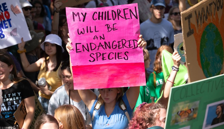 People participate in a Youth Climate Strike march in Washington D.C, Friday, September 20, 2019.