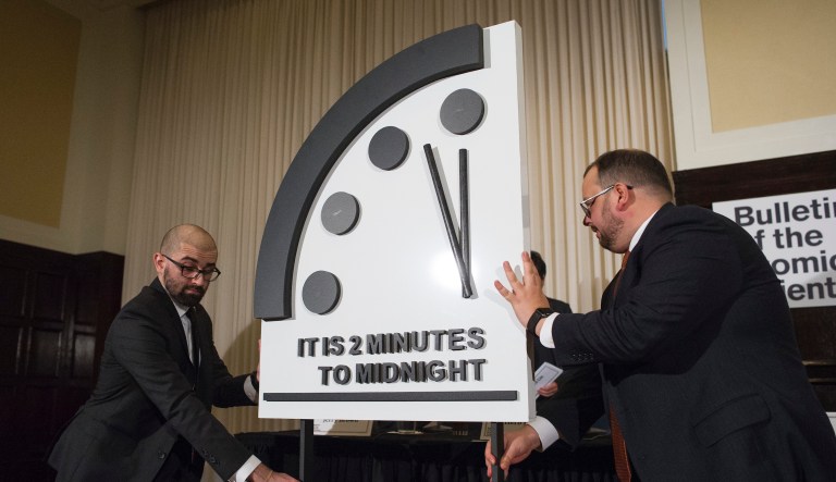 The Doomsday Clock is moved during The Bulletin of the Atomic Scientists news conference, in Washington, Thursday, Jan. 24, 2019.The Doomsday Clock is set at two minutes to Midnight.                                                                       