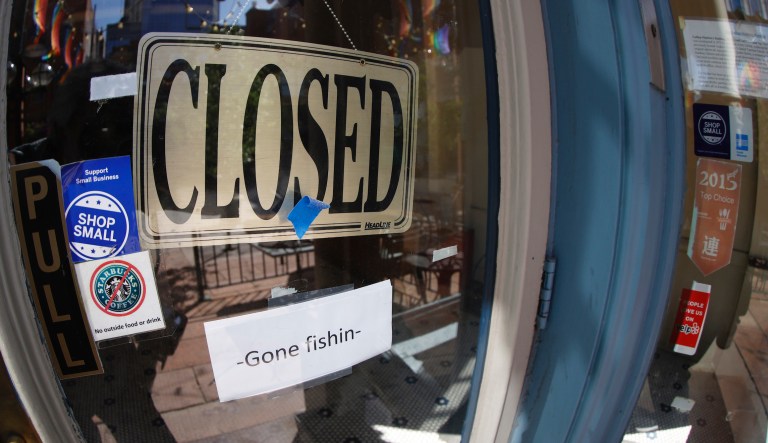 A closed sign hangs in the door of The Market, a long-time restaurant and food store located in Larimer Square, that has closed permanently signs because of the new coronavirus Thursday, June 18, 2020, in downtown Denver.