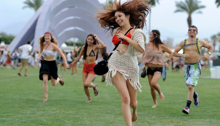 FILE - This April 13, 2012 file photo shows festivalgoers running toward the main stage at the 2012 Coachella Valley Music and Arts Festival in Indio, Calif. The Coachella music festival in Southern California has been postponed amid virus concerns.
The festival is organized by concert promoter Goldenvoice, which released a statement Tuesday saying it will be rescheduled for two weekends in October. For most people, the new coronavirus causes only mild or moderate symptoms, such as fever and cough. For some, especially older adults and people with existing health problems, it can cause more severe illness, including pneumonia. The vast majority of people recover from the new virus. According to the World Health Organization, people with mild illness recover in about two weeks, while those with more severe illness may take three to six weeks to recover.