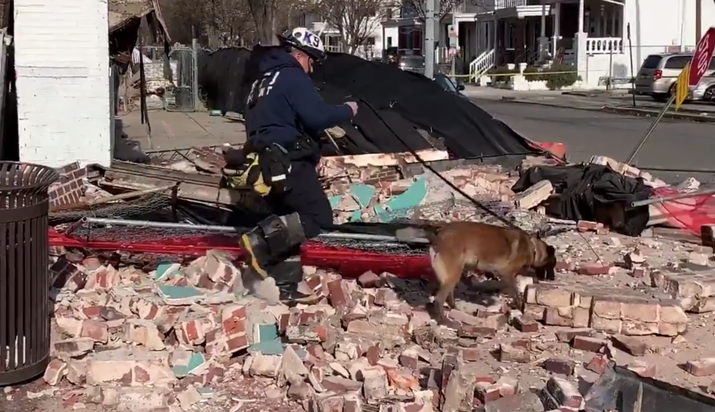 WATCH: Camera captures moment pedestrians narrowly avoid building collapse