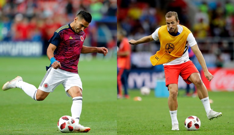 Two soccer players warm up during the World Cup tournament in Russia. Colombia's Radamel Falcao is on the left; England's Harry Kane is pictured on the right.