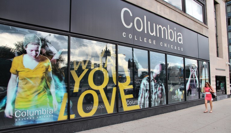 Person walks past Columbia College in Chicago. It is a higher education institution specializing in arts and media. It has 10,142 students (2014).