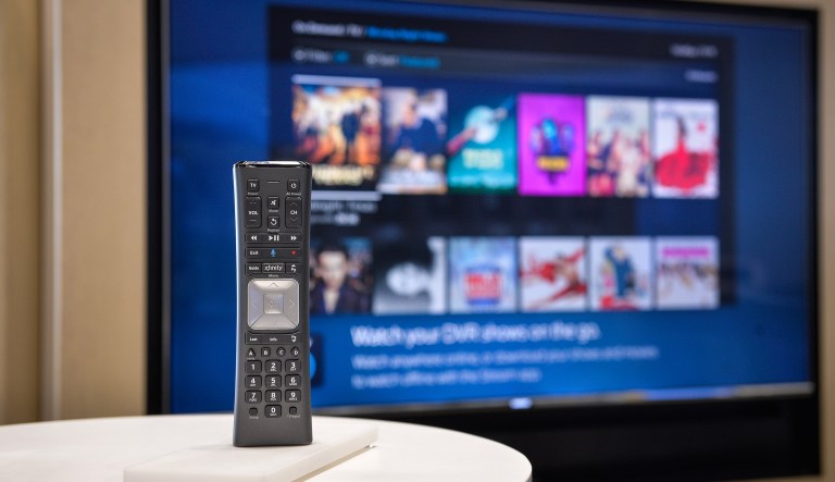 A television remote sits on display at a Comcast Corp. Xfinity store in King Of Prussia, Pennsylvania, U.S., on Tuesday, July 25, 2017. Comcast Corp. is scheduled to release earning figures on July 27.