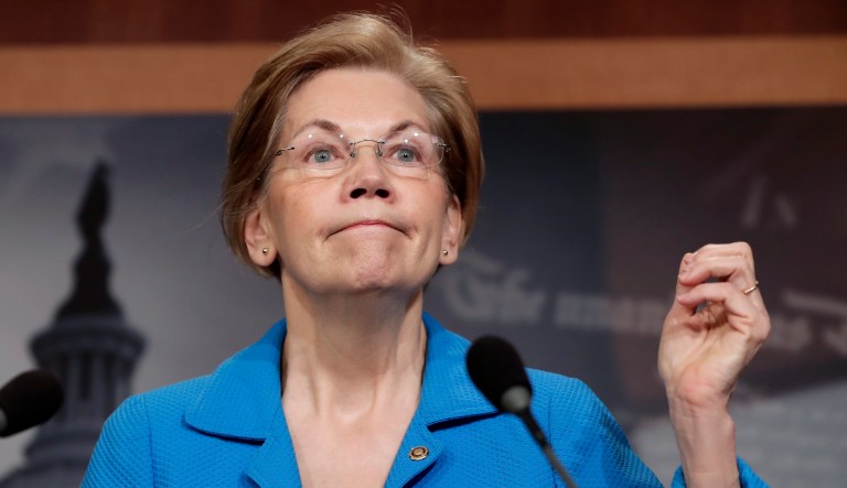 Sen. Elizabeth Warren, D-Mass., a key member of the Banking Committee, expresses her opposition to a move in the Senate to pass legislation that would roll back some of the safeguards Congress put into place after a financial crisis rocked the nation's economy ten years ago, during a news conference at the Capitol in Washington, Tuesday, March 6, 2018. Warren, who ran for office in the aftermath of the great recession in 2008, serves as ranking member of the Subcommittee on Financial Institutions and Consumer Protection.