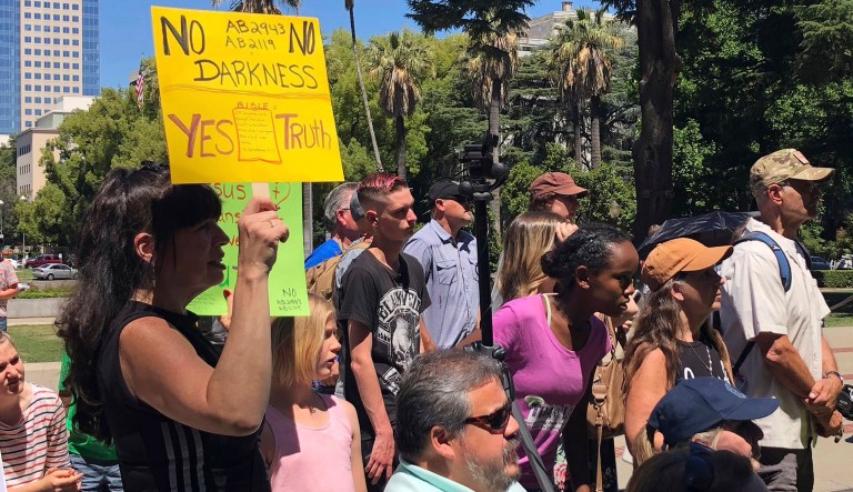 Opponents of a California bill to declare gay conversion therapy a fraudulent practice gather at a rally outside the Capitol as the Senate holds a hearing on the matter inside in Sacramento, Calif., Tuesday, June 12, 2018. Opponents argue the bill would deny them their right to seek out the therapy through religious practices or other means.