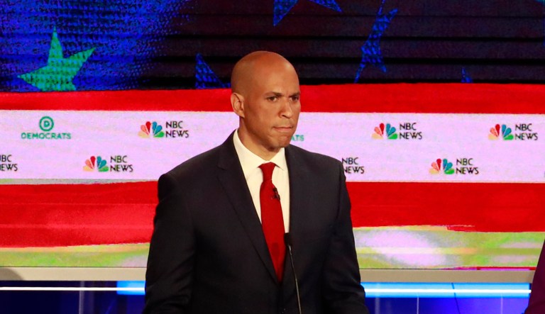 Democratic presidential candidate Sen. Elizabeth Warren, D-Mass., center, answers a question, during the Democratic primary debate hosted by NBC News at the Adrienne Arsht Center for the Performing Art, Wednesday, June 26, 2019, in Miami.