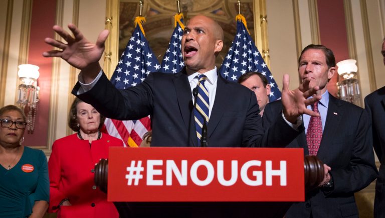 Sen. Cory Booker, D-N.J., center, calls for gun control legislation in the wake of the mass shooting in an Orlando LGBT nightclub this week, Thursday, June 16, 2016, during a news conference on Capitol Hill in Washington. From left are, Rev. Sharon Risher, a clinical trauma chaplain in Dallas, who lost her mother Ethel Lance and two cousins in the racially-motivated shooting at the historic Emanuel AME Church in Charleston, N.C., in 2015, Sen. Dianne Feinstein, D-Calif., Sen. Chris Murphy, D-Conn., and Sen. Richard Blumenthal, D-Conn. 
