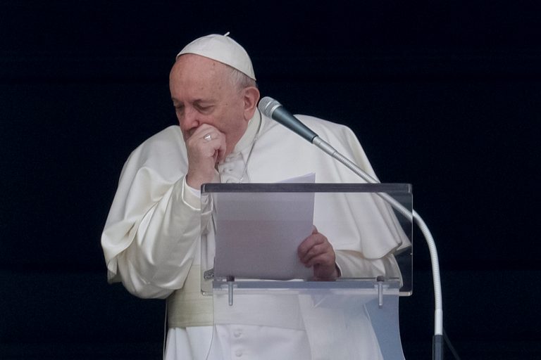 Pope Francis coughs during the Angelus noon prayer he recited from the window of his studio overlooking St. Peter's Square, at the Vatican, Sunday, March 1, 2020.