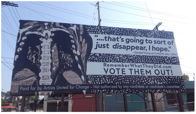 A photograph of Nate Lewis's billboard near the debate site, at Carnegie and 77th, Cleveland.