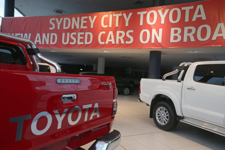 Vehicles are on display at a Toyota dealership in Sydney, Monday, Feb. 10, 2014. Toyota announced it will stop making cars in Australia by the end of 2017, spelling a final blow to auto manufacturing in the country, where car companies say high production costs and tough competition have made the business unviable. (AP Photo/Rick Rycroft)