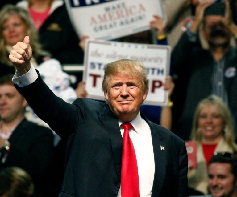 Republican presidential candidate Donald Trump is intentionally outrageous and entertaining from the top of his head to the tips of his toes. (AP Photo/Rogelio V. Solis)