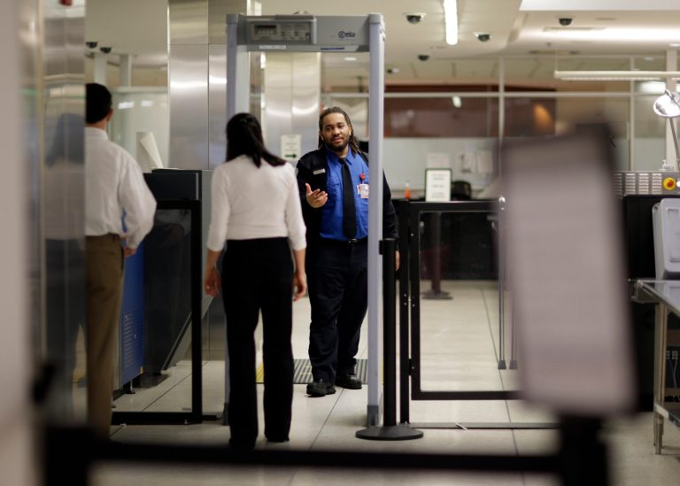 The Transportation Security Administration has an adjudication center, created in 2005, which hires contractors who then screen the potential workers. (AP/Patrick Semansky)