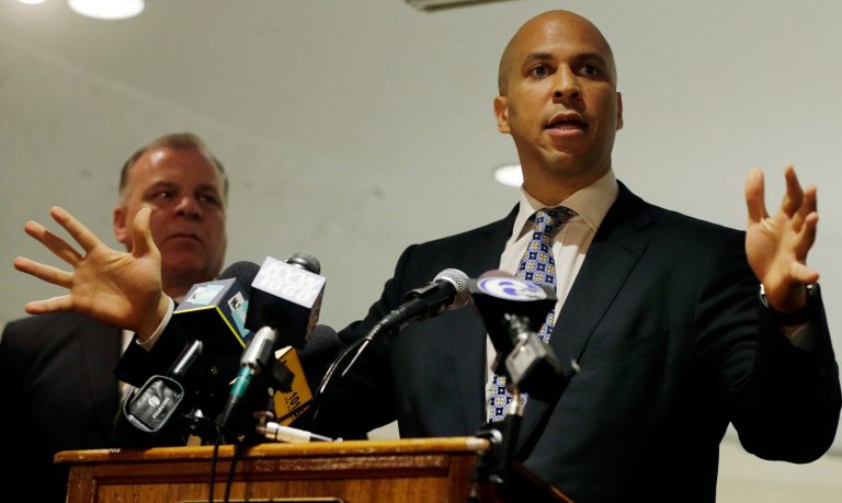 Senate candidate Newark Mayor Cory Booker, right, addresses a gathering of supporters at an event in Deptford Township, N.J. Tuesday, June 18. Several lawmakers and local officials gathered Wednesday with Booker to announce their endorsements, saying he has the best chance of the four Democrats in the race of winning the seat. (AP Photo/Mel Evans)