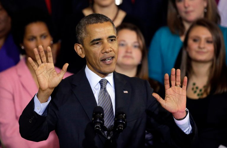FILE - In this Oct. 30, 2013, file photo, President Barack Obama speaks at Boston's historic Faneuil Hall about the federal health care law. Obama says he's sorry Americans are losing health insurance plans he repeatedly said they could keep under his signature health care law. But the president stopped short of apologizing for making those promises in the first place. 