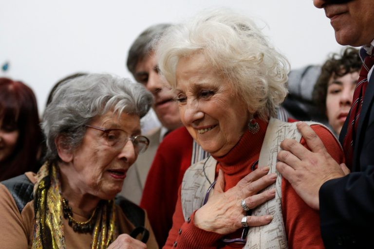 Estela de Carlotto, president of Grandmothers of Plaza de Mayo, right, reacts before a news conference in Buenos Aires, Argentina, Tuesday, August 5, 2014. Carlotto, one of the most prominent human rights activists in Argentina, has located the grandson born to her daughter Laura in captivity during the military dictatorship that ruled Argentina from 1976-1983. Laura was kidnapped and killed by the military in August 1978. (AP Photo/Victor R. Caivano)