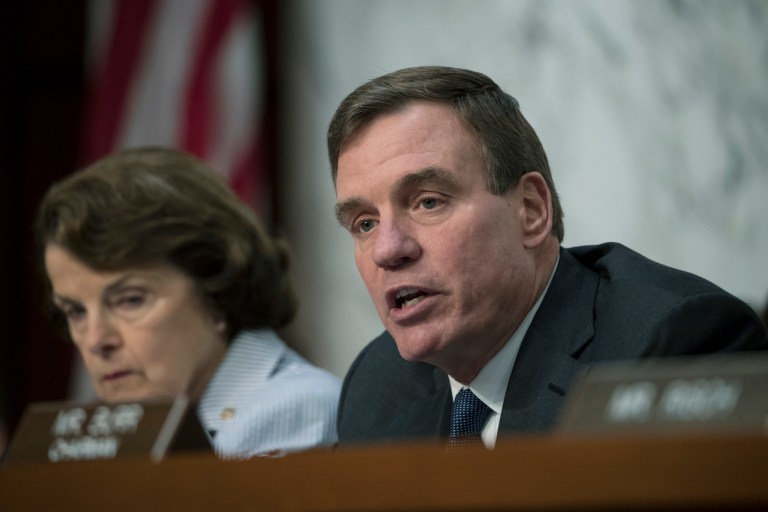 Warner was referencing the report of a leaked document by The Intercept showing the NSA acknowledged that the Russian military carried out cyberattacks on dozens of local election systems. (AP Photo/J. Scott Applewhite)