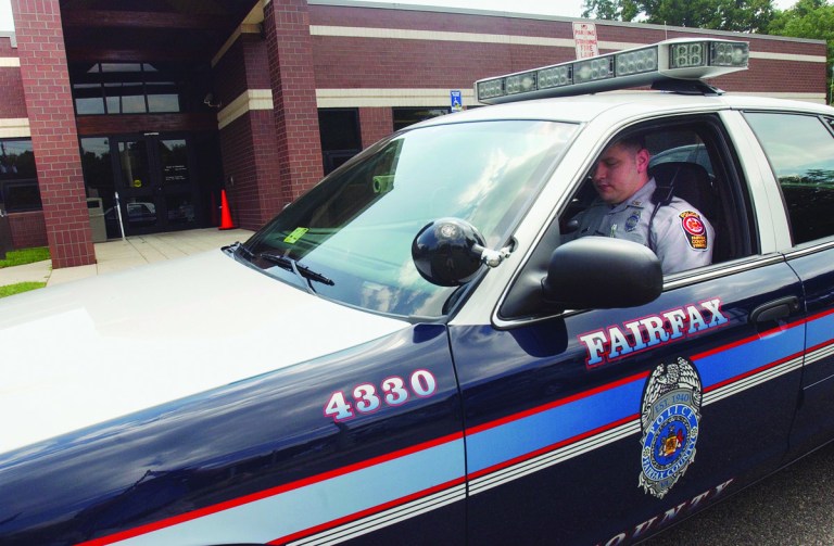 Jeff Mankie/ExaminerFairfax County Police Officer Tim Schulz outside the Franconia Police Station on Thursday, August 17, 2006.  Schulz is three years out of the county's police academy which has found recruiting to be tougher with competition from federal, state, and other local departments employing law enforcement.