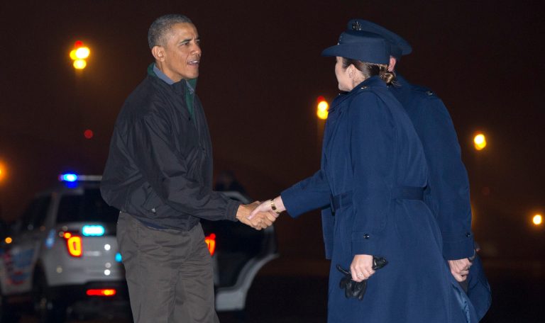 President Obama is greeted as he arrives at Andrews Air Force Base, Md., Saturday, Jan. 24, 2015, prior to boarding Air Force One, for a trip to New Delhi, India, by way of Ramstein Air Base, Germany. (AP Photo/Carolyn Kaster)