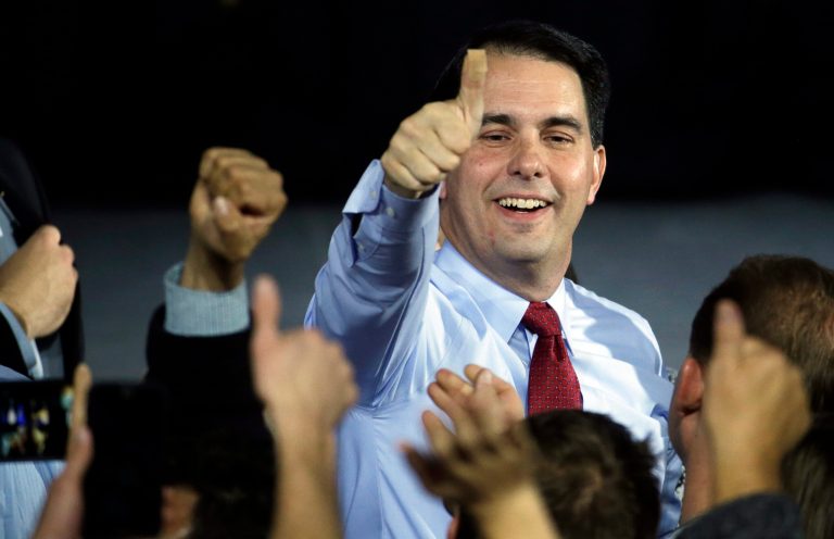Wisconsin Gov. Scott Walker won three gubernatorial elections in four years, a fact that he repeats often in his early stump speeches across the country. (AP Photo)