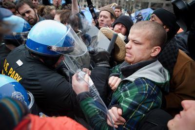 Police confront Occupiers, tear down tents
