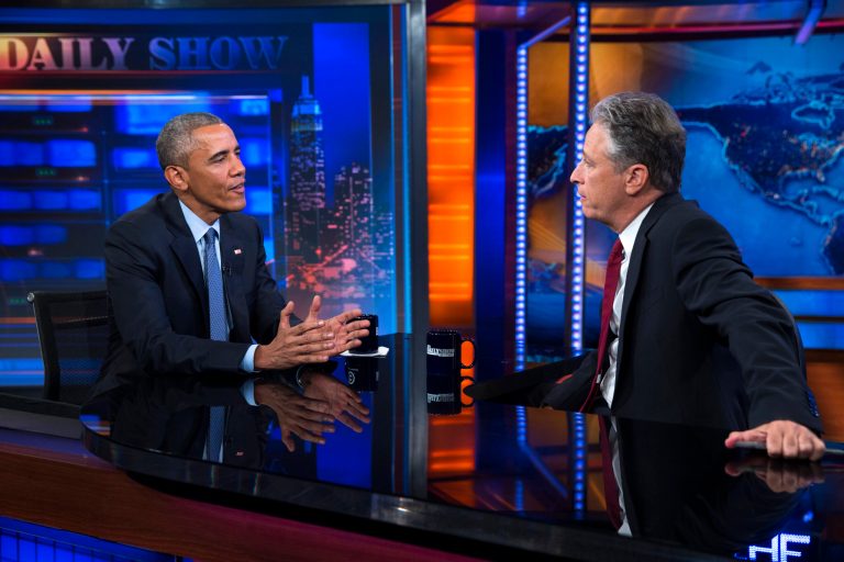 President Barack Obama, left, talks with Jon Stewart, host of 