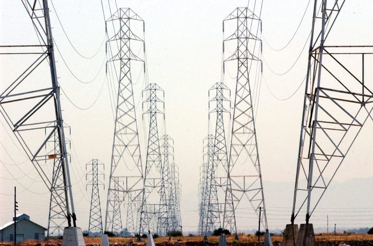 Power line towers are shown July 12, 2002 in Palo Alto, California. (Getty Image)