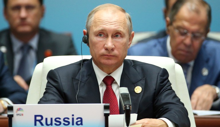 Russian President Vladimir Putin said Tuesday he is considering expelling another 155 State Department personnel from Russia. (Wu Hong/Pool Photo via AP)