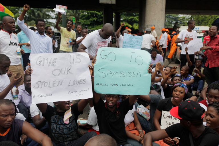 People attend a demonstration calling on  government to rescue kidnapped school girls of a government secondary school Chibok, during workers day celebration in Lagos, Nigeria. Thursday, May, 1. 2014, Scores of girls and young women kidnapped from a school in Nigeria are being forced to marry their Islamic extremist abductors, a civic organization reported Wednesday. At the same time, the Boko Haram terrorist network is negotiating over the students' fate and is demanding an unspecified ransom for their release, a Borno state community leader told The Associated Press. He said the Wednesday night message from the abductors also claimed that two of the girls have died from snake bites. The message was sent to a member of a presidential committee mandated last year to mediate a ceasefire with the Islamic extremists, said the civic leader, who spoke on condition of anonymity because he is not authorized to speak about the talks. (AP Photo/ Sunday Alamba)