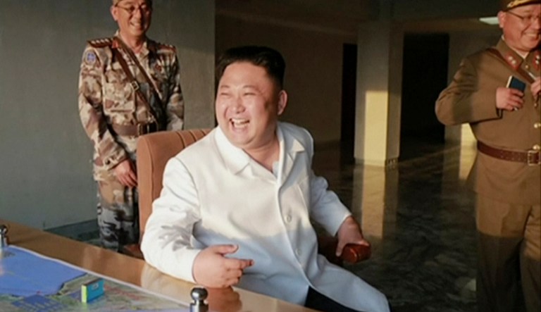 This image made from video of an undated still image broadcasted in a news bulletin on Tuesday, May 30, 2017, by North Korea's KRT shows North Korean leader Kim Jong Un watches a missile launch. (KRT via AP Video)