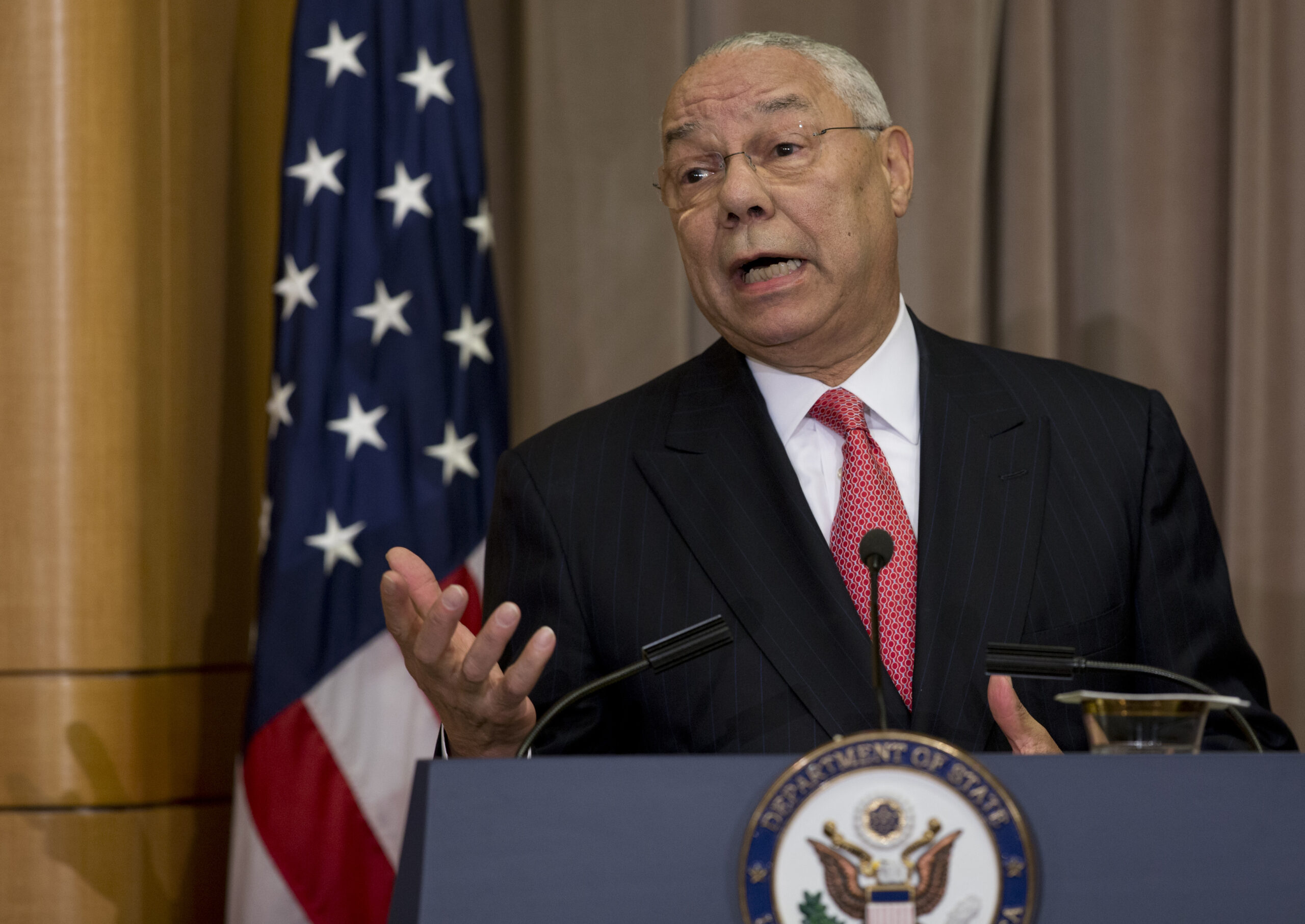 Colin Powell slams voter ID laws, urges police restraint following Ferguson report