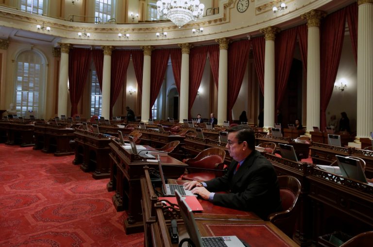 State Sen. Joel Anderson, R-Alpine, works at his desk before lawmakers gathered for the start of the Senate session in Sacramento, Calif., Saturday, Sept. 9, 2013. (AP File)