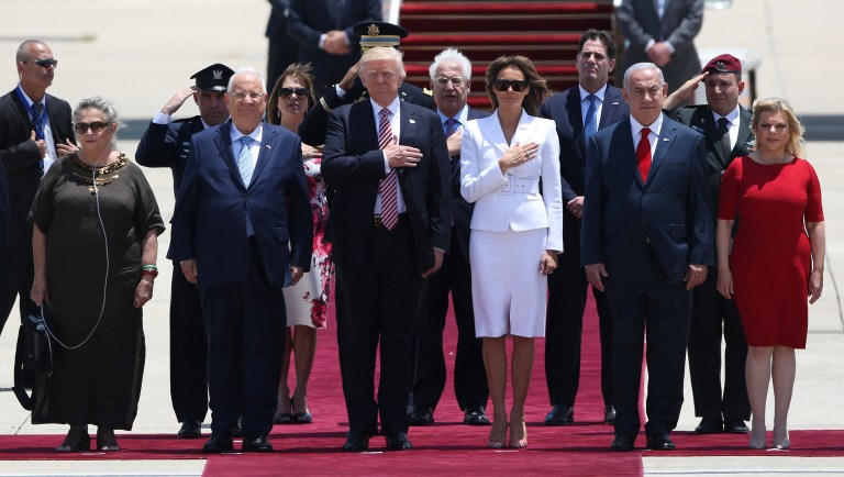 President Trump and his wife Melania, center, stand in attention during welcome ceremony accompany by the Israeli President Rueben Rivlin and his wife Nechama, on the left, and Prime Minister Benjamin Netanyahu and his wife Sarah in Tel Aviv. (AP Photo/Oded Balilty)
