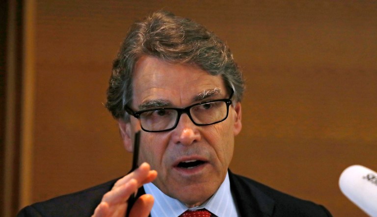 "No reasonable person can deny the thumb, or even the whole hand, if you will, has been put on the scale in favor of certain political outcomes," Perry said. (AP Photo/Andy Wong)