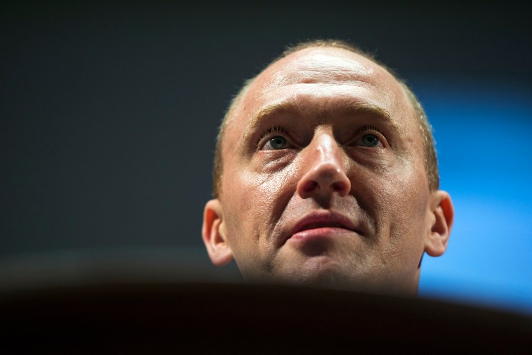 Then-campaign staffer Carter Page was told he could make the trip as a private citizen. (AP Photo/Pavel Golovkin)