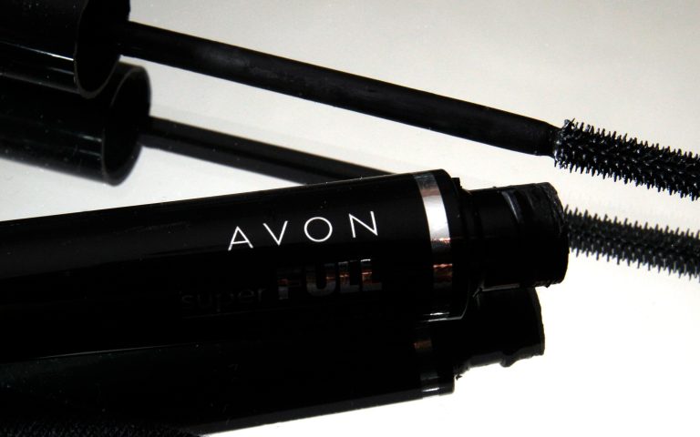 FILE - In this July 28, 2010 file photo, a container and brush of Super Full mascara by Avon sits on display in North Andover, Mass. Avon Products Inc. on Thursday, May 1, 2014 said it will pay $135 million in fines and other fees to settle a long-standing U.S. government probe into whether the cosmetics company paid bribes in China and other countries to gain favors. (AP Photo/Elise Amendola, File)