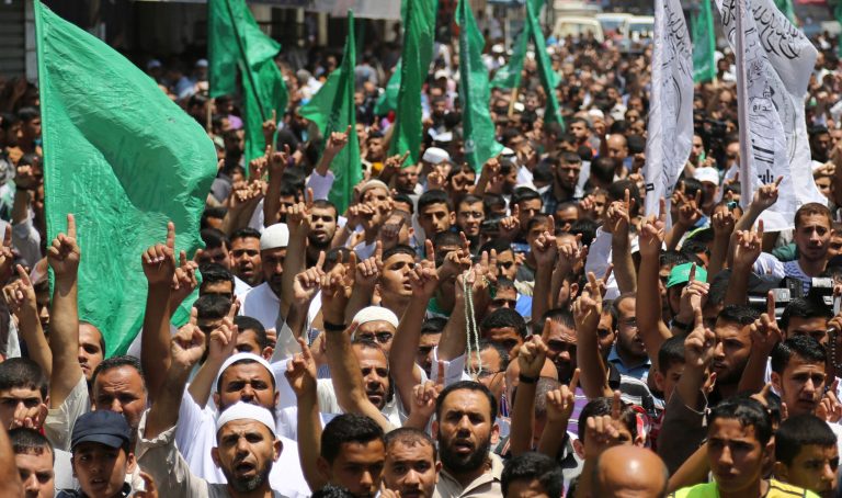 Palestinian Hamas supporters chant islamic slogans during a demonstration against the Israeli military operations in the West Bank in Jebaliya refugee camp, northern Gaza Strip, Friday, July 4, 2014. (AP/Hatem Moussa)