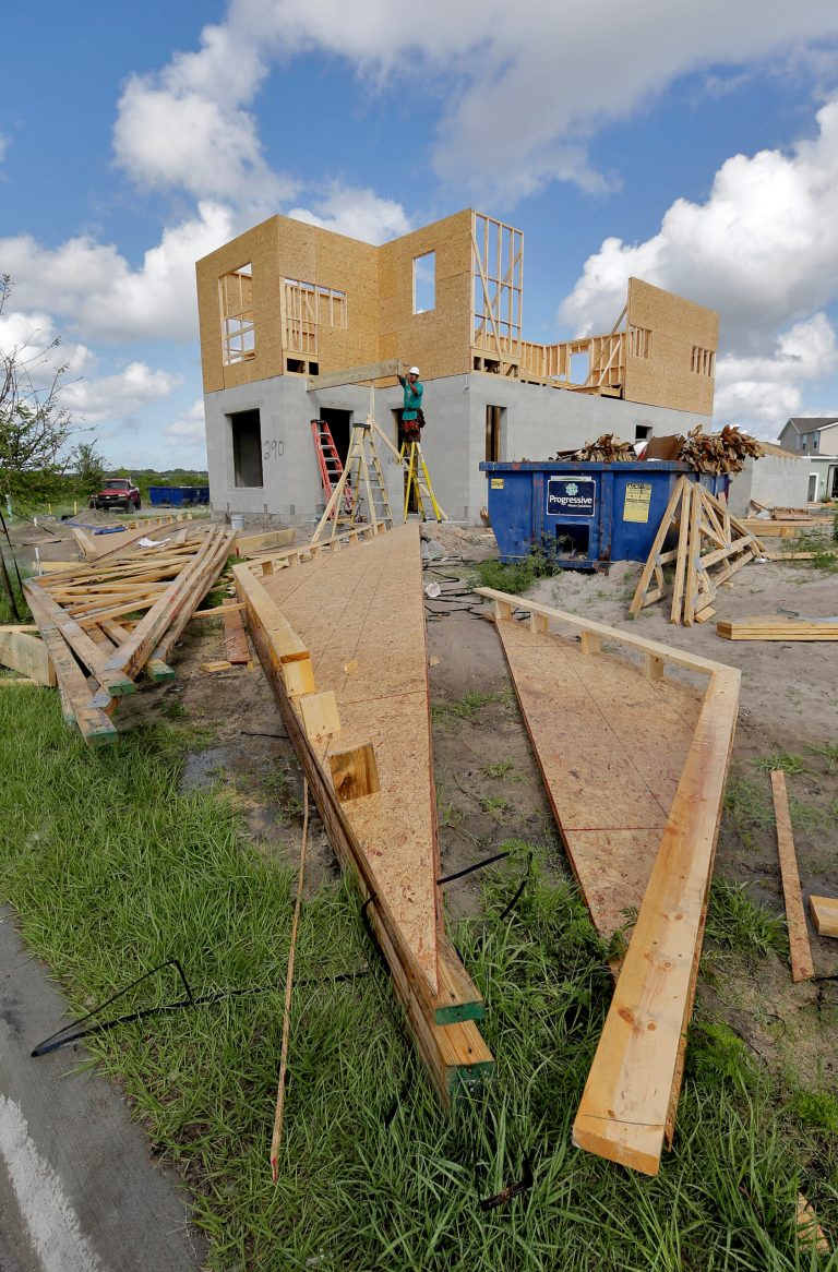 This May 15, 2014 photo shows new home under construction in the Winthrop sub-division in Riverview, Fla. The Commerce Department reports on U.S. home construction in June on Thursday, July 17, 2014. (AP Photo/Chris O'Meara)