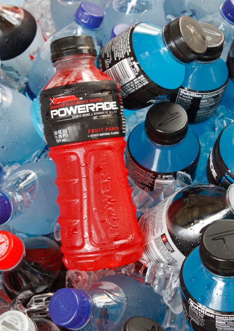FILE - In this Aug. 5, 2010 file photo, bottles of Powerade sports drink and other Coca-Cola products are chilled over ice in Orlando, Fla. A controversial ingredient, brominated vegetable oil, is being removed from some Powerade sports drinks. (AP Photo/Jon Elswick, File)