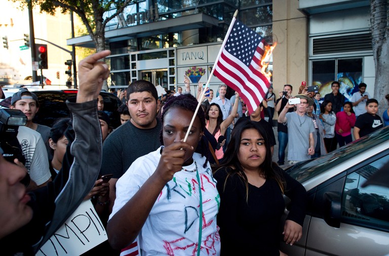 Josh Earnest said elected officials, including the incoming Republican president, should strive to protect freedom of speech and expression 
