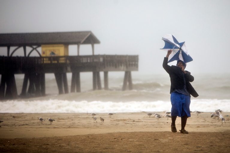 As Matthew bears down, politics has taken a back seat to safety at a crucial point in the campaign. (AP Photo/Stephen B. Morton)