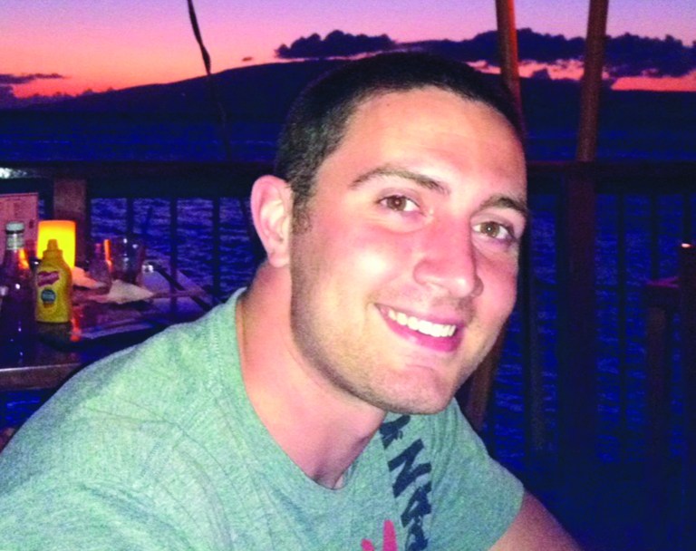 The undated photo provided by the family shows Alex Teves. Teves, 24, was one of the victims killed in the Friday, July 20, 2012 movie theater shooting in Aurora, Colo. (AP Photo/Teves Family)