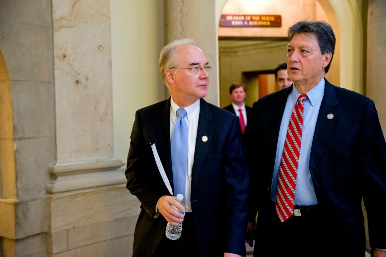 Rep. Tom Price, R-Ga., left, and Rep. Lynn Westmoreland, R-Ga., leave the office of House Speaker John Boehner on Capitol Hill on Friday, before a vote on a measure to let insurers keep offering health coverage that falls short of the law's standards. (AP Photo/J. Scott Applewhite)