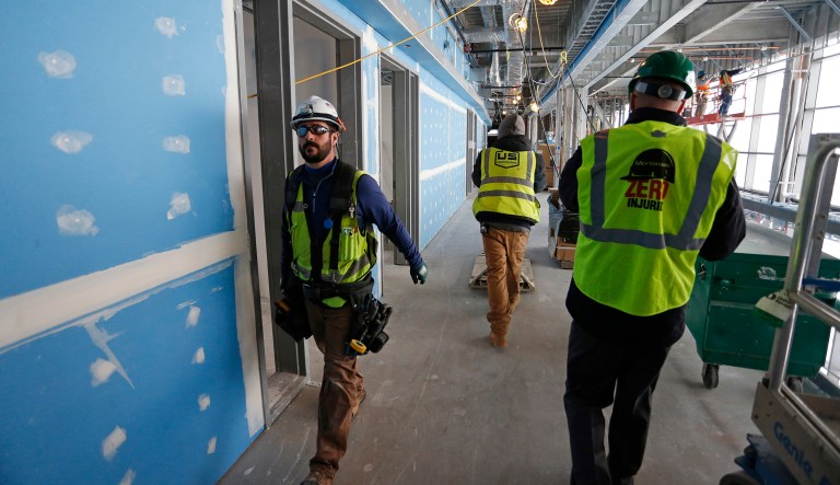 The American working class bought into the great and evil capitalist lie. (AP Photo/Brennan Linsley)