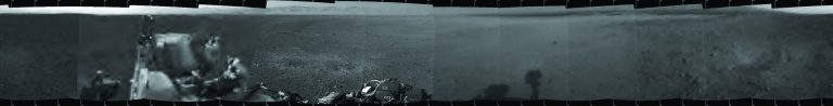 This panoramic view comprised of multiple images put together, provided by NASA on Wednesday, Aug. 8, 2012, shows the first 360-degree panoramic view from NASA's Curiosity rover, taken with the Navigation cameras. Mount Sharp is to the right, and the north Gale Crater rim can be seen at center. The rover's body is in the foreground, with the shadow of its head, or mast, poking up to the right. (AP Photo/NASA)