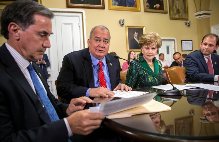 Lawmakers go before the House Rules Committee to prepare a bill for floor debate that would create a financial control board for Puerto Rico and restructure some of the U.S. territory's $70 billion debt, at the Capitol. (AP Photo/J. Scott Applewhite)